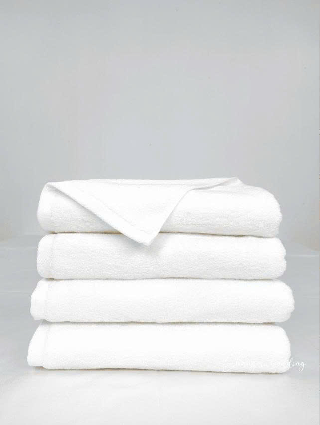 JESMARY - Quà Tặng Khăn Cotton Thêu Logo – Vũ Khí Marketing Mềm Mại Nhưng Mạnh Mẽ